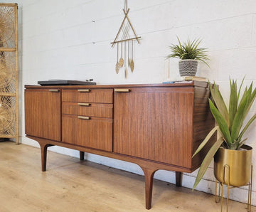 Meredew Credenza with Zebrano wood, featuring new brass hardware, adjustable shelves, and expertly restored vintage finish.