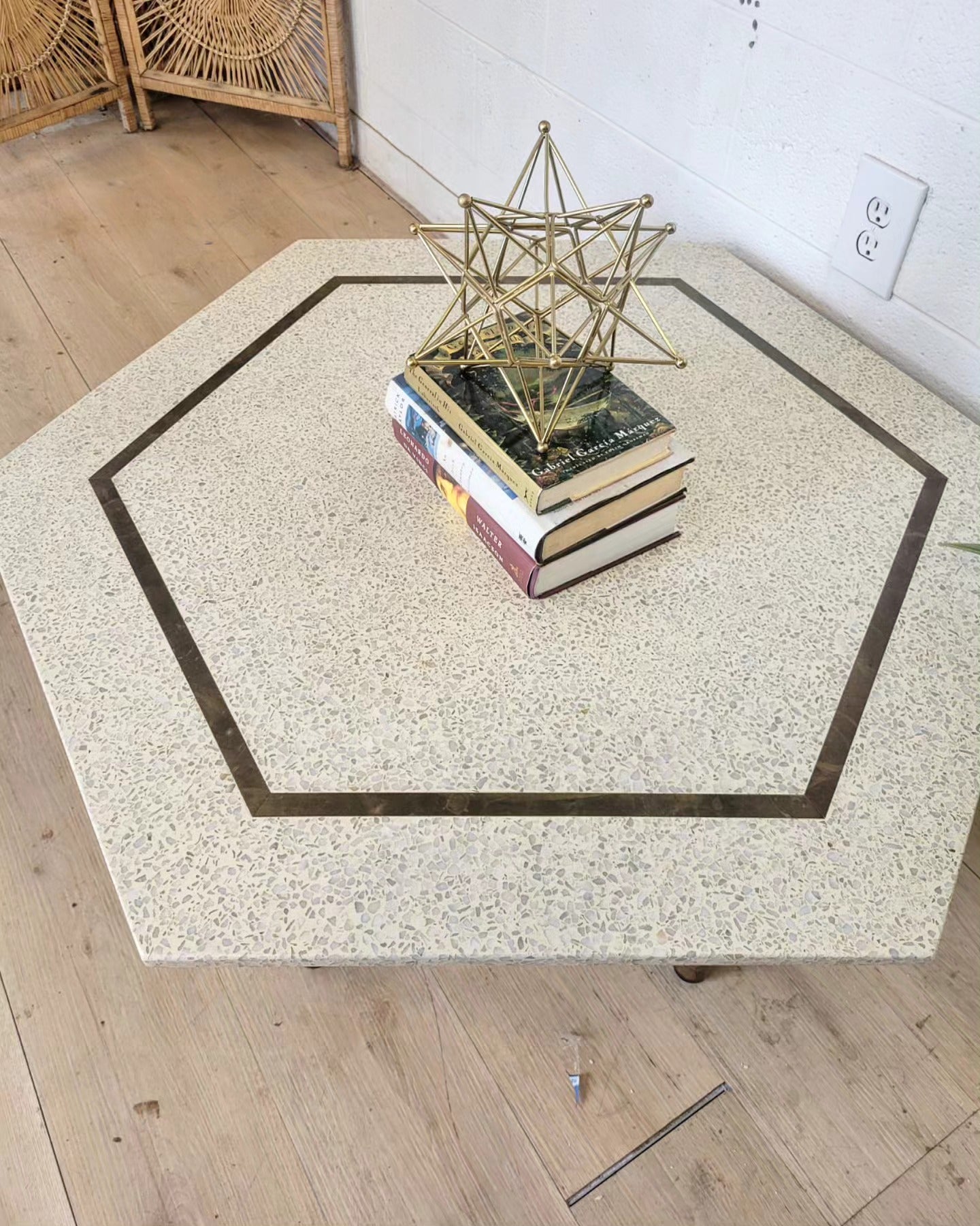 Harvey Probber Travertine Hexagon Coffee Table with Brass Inlay on Mahogany Base, Showcased with Books and Geometric Decor Piece